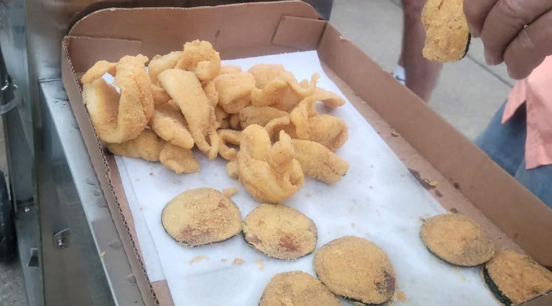 Crispy fried vegetables made with Frenzy Fish Fry Southern Crunch fish fry mix and cornmeal breading, including zucchini, okra, and fried green tomatoes