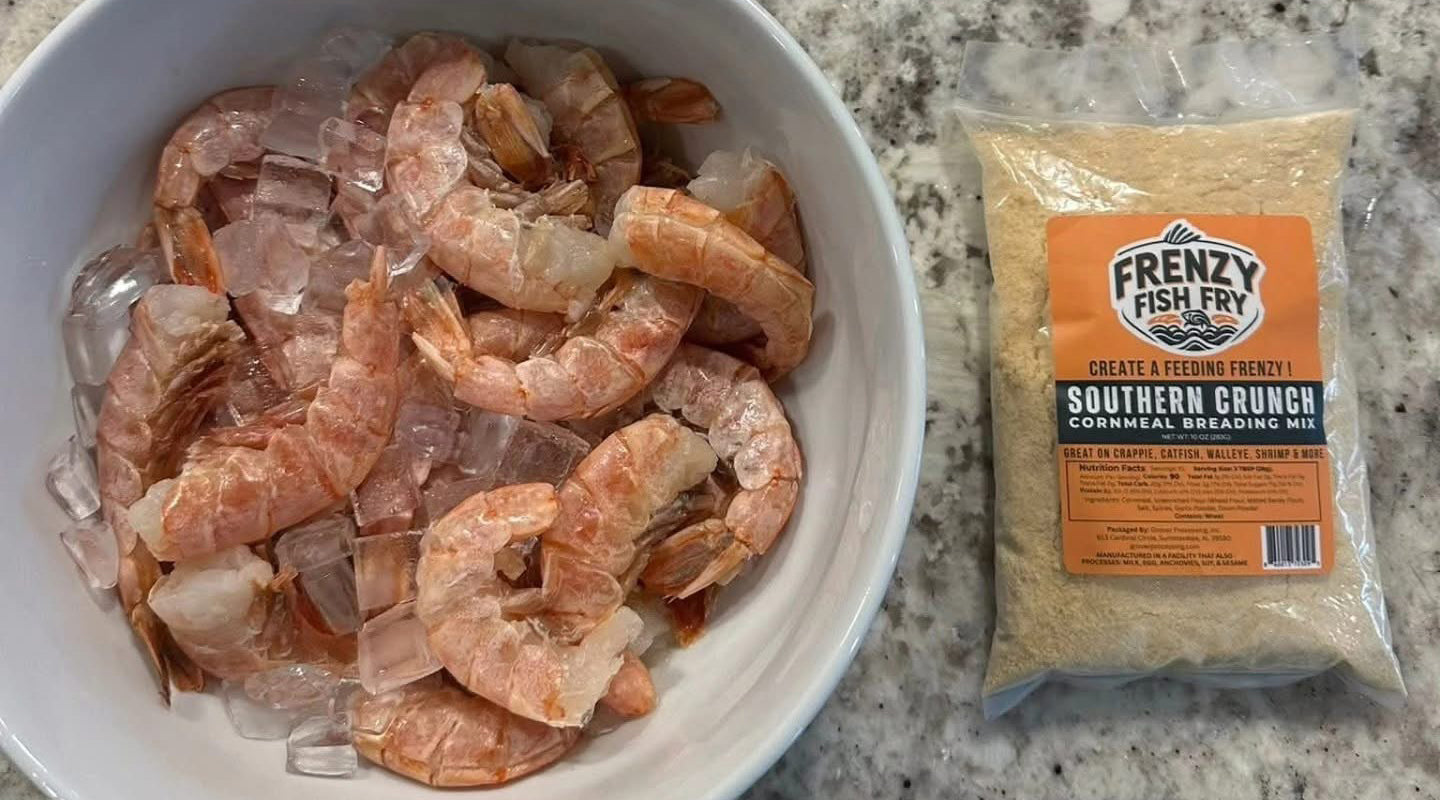 Crispy golden shrimp made in the air fryer using Frenzy Fish Fry Southern Crunch fish fry mix and cornmeal breading, served with lemon and dipping sauces
