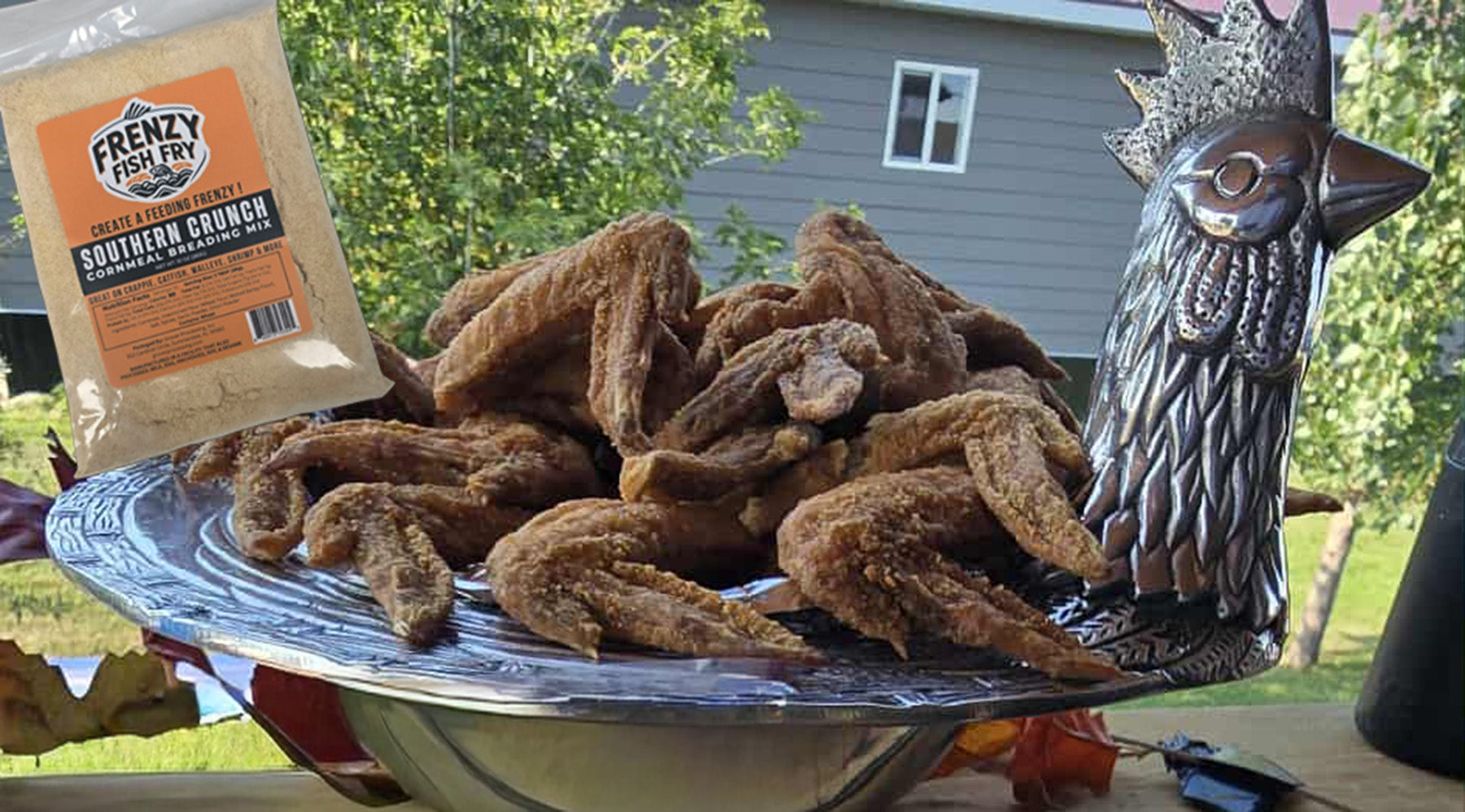 Crispy golden chicken wings made with Frenzy Fish Fry Southern Crunch fish fry mix and cornmeal breading, served with dipping sauces